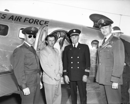 Photograph of Air Force ROTC members boarding a plane.