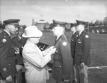 University President Theophilus giving out awards at the Army ROTC ceremony.