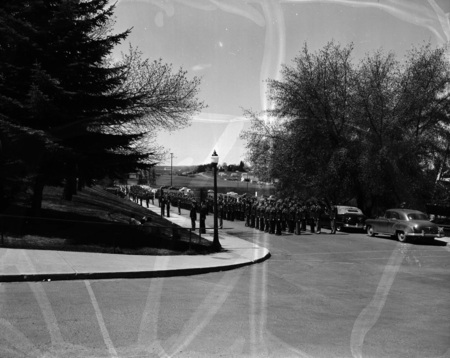 ROTC members marching in formation for Spring Inspection.