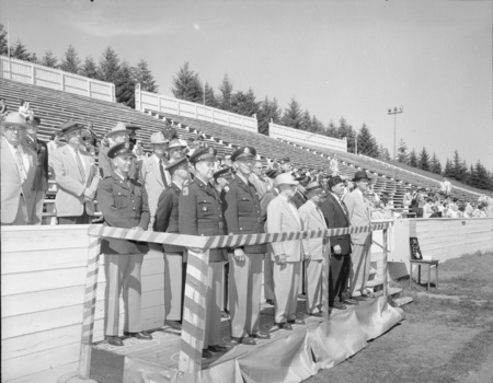 A crowd to watch Spring Inspection including both civilian and military personnel.