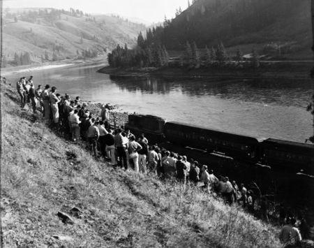 Students gather on a hillside during geology field trip.