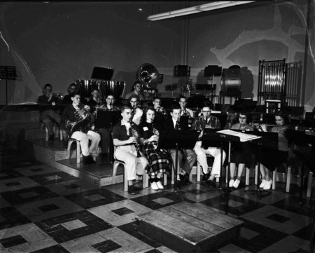 Students playing instruments at band practice.
