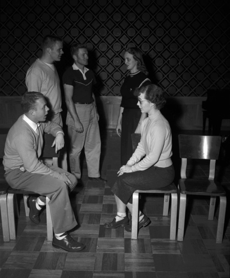 Choir students socializing.