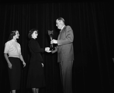 University of Idaho president J.E. Buchanan handing out awards.