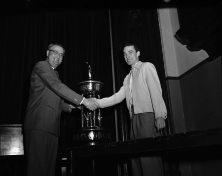 University of Idaho president J.E. Buchanan handing out awards.