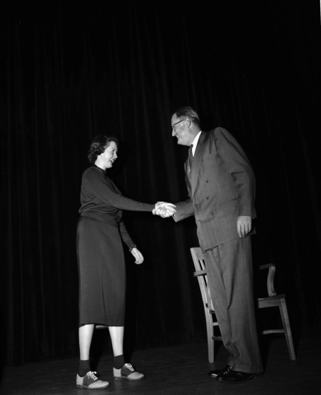 University of Idaho president J.E. Buchanan handing out awards.