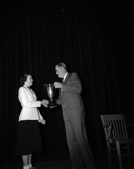 University of Idaho president J.E. Buchanan handing out awards.