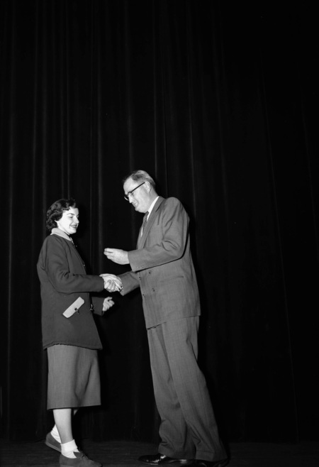 University of Idaho president J.E. Buchanan handing out awards.
