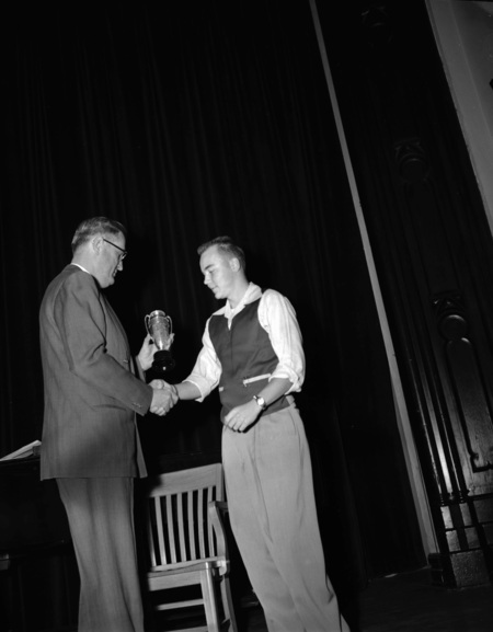 University of Idaho president J.E. Buchanan handing out awards.