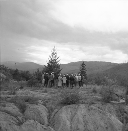 Students gather on a hilltop during a summer hiking class.