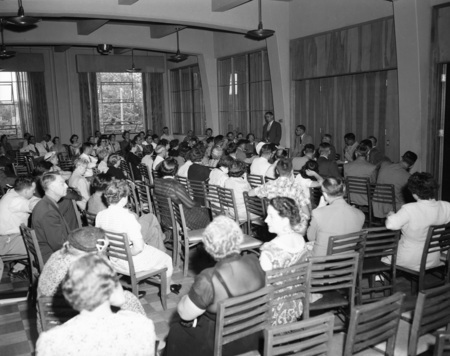 Students gather to hear unidentified speaker.