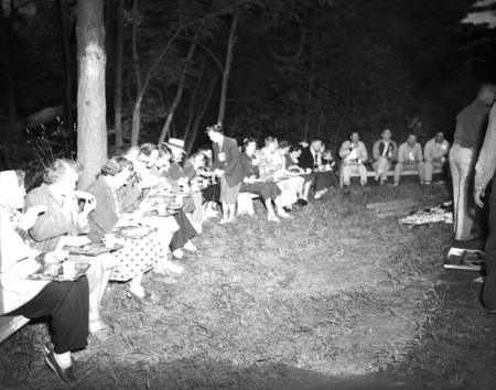 Students dine together outside.