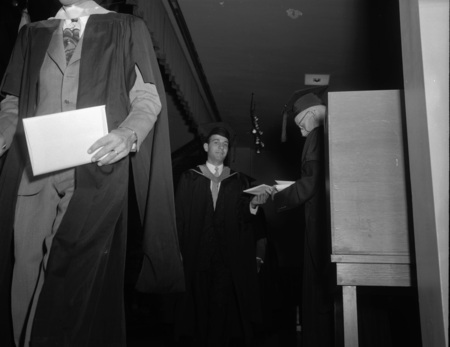 Students receive awards while on stage.