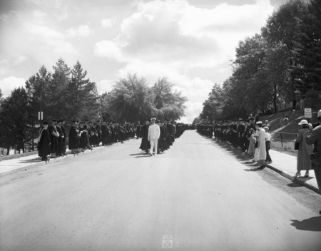 Faculty lead the procession to Memorial Gym where Commencement is held.