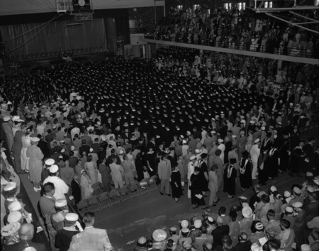 Students gather in the Memorial Gym for Commencement.