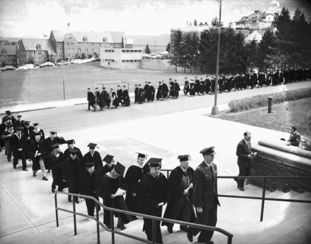 Faculty lead the procession to Memorial Gym where Commencement is held.