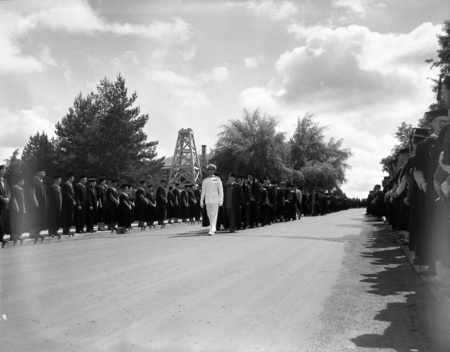 Faculty lead the procession to Memorial Gym where Commencement is held.
