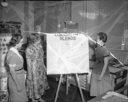 Students work on a reading workshop for primary schoolers.