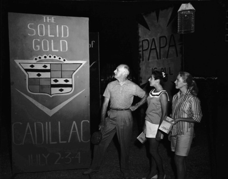 Cecil Matson, Mary Ellen Bennett, and Nancy Moen arrange scenery flats