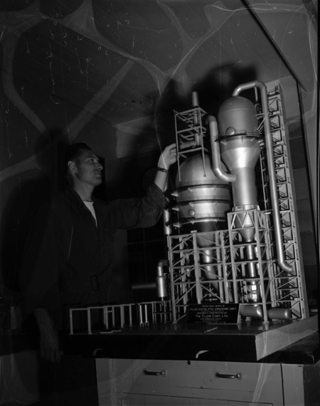 Perry Christianson with fluid catalytic cracking model.