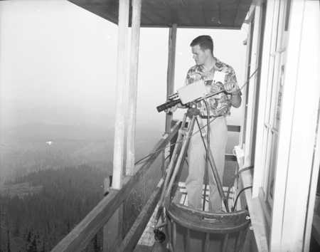 College of Forestry student operating television camera at fire detection conference.