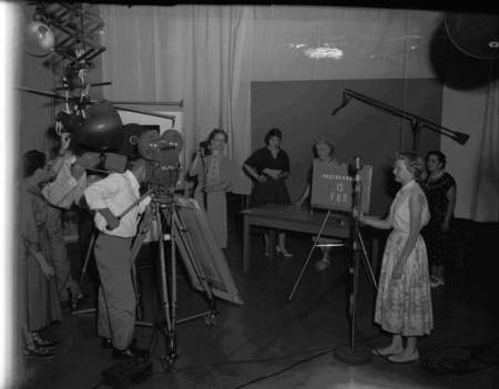 Sarah Hutchinson, editor of Idahonian, giving Idaho Press Association award to Shirley Snowball of Aberdeen, Idaho.