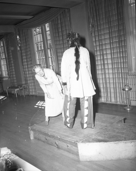 History conference on Native American costumes.