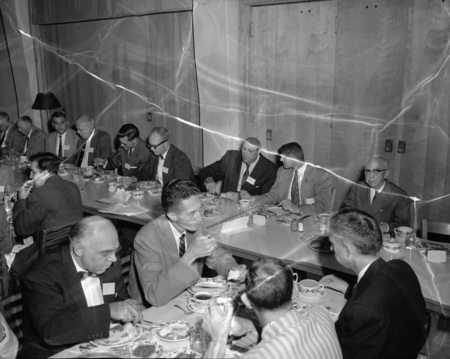 Law Faculty dining together at the College of Law Institute luncheon.