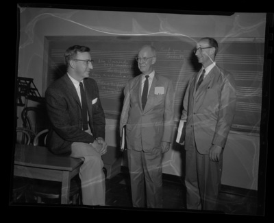 Glen Lockery (left) with members of the staff of regional singing teachers.