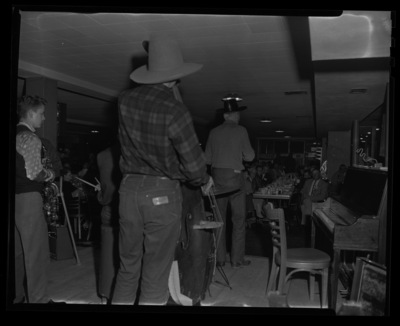 A photograph taken from behind the live band playing in the Elk's Club after dinner at the IRA meeting.