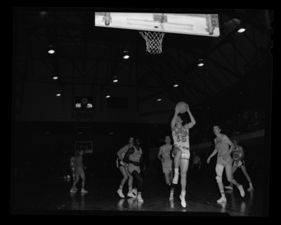 University of Idaho players try to make a basket at a University of Idaho vs. Montana State basketball game in Memorial Gym.