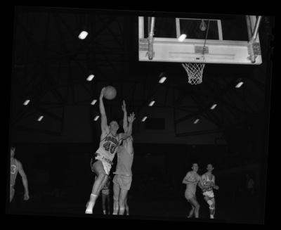 University of Idaho players try to make a basket at a University of Idaho vs. Montana State basketball game in Memorial Gym.