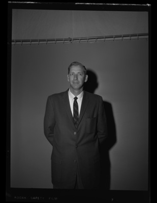 Portrait of an unidentified prospective basketball coach.