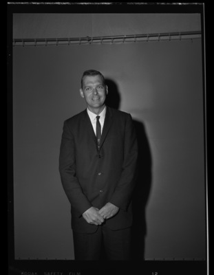 Portrait of an unidentified prospective basketball coach.