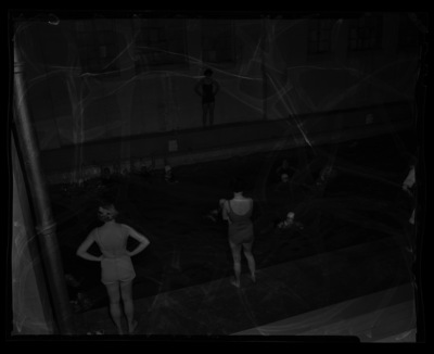Women swimming for a physical education class at the University of Idaho pool in Memorial Gym.