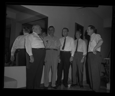 Six men stand together at the Idaho's Grocer's Conference at the University of Idaho.