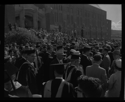 Graduates and their families leave Memorial Gym after the Commencement ceremony has finished.
