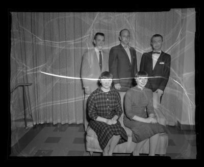 Student Idaho Education officers posing for a group photograph. (standing): Lamar Kofoed, Paul Kaus, advisor; Del Gardnet. (seated): Mary Sue Kniefel, president, and Vauna Blevins