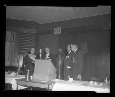 Attendees at the College of Forestry's 50th Anniversary Banquest at the Elk's Lodge in downtown Moscow. From (l-r) Mrs. Wohletz, Dean Ernest W. Wohletz, and unidentified alumni.