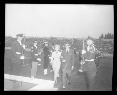 Homecoming queen Charmaine Deitz being presented at the Homecoming Game.