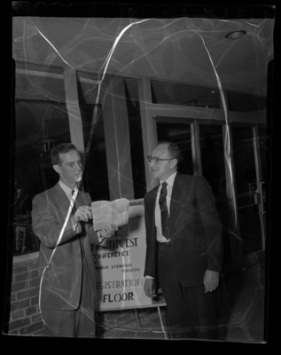 Professor Warren Wolfe with new chairman of the Northwest Foreign Language Conference, Robert Kahn at University of Idaho.