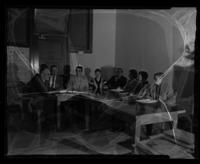 Boyd Martin, Dean of College of Letters and Science, and students discussing the Citizenship Clearing House debates