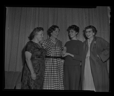 La Verda Garrison received a pendant award for "Outstanding Girl Editor" from at the 1960 hisgh school Journalism Conference at the University of Idaho. From left to right: Lucile McDonald of the Seattle Times, author Grace Jordon, Miss La Verda Garrison of Nampa, and Gladys Swank of the Lewiston Tribune.