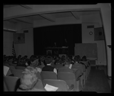Students sit in Borah Theater for a workshop on yearbooks during the high school journalism conference.