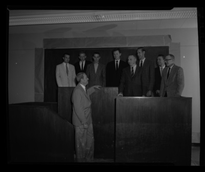 College of Law Dean E.S. Stimson (bottom left) with law scholarship winners in mock court.