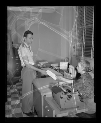 Law student John Barrett and department secretary Mickey.