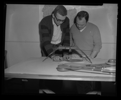 College of Mines students using a viewing device from the Bureau of Aeronautics