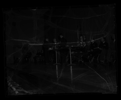 President Theophilus presents an award to a student at the combined ROTC awards ceremony at the University of Idaho.