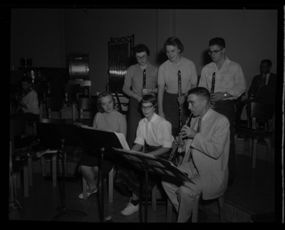 Clarinet players in the symphony orchestra practice together.