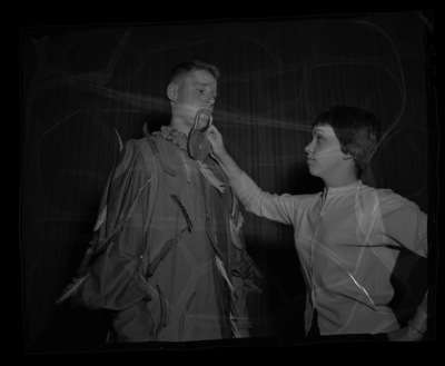 Chet Earls, left, dressed as Papageno and Vicki Fisher, right, in a rehearsal for scenes from The Magic Flute for the annual "Evening of Opera" workshop presented by the School of Music.